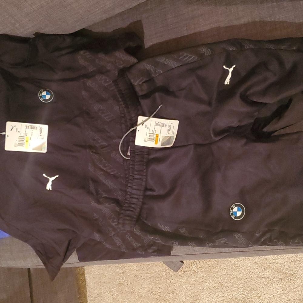 BMW/ Puma jogging pants and top black. Top size medium and pants size small